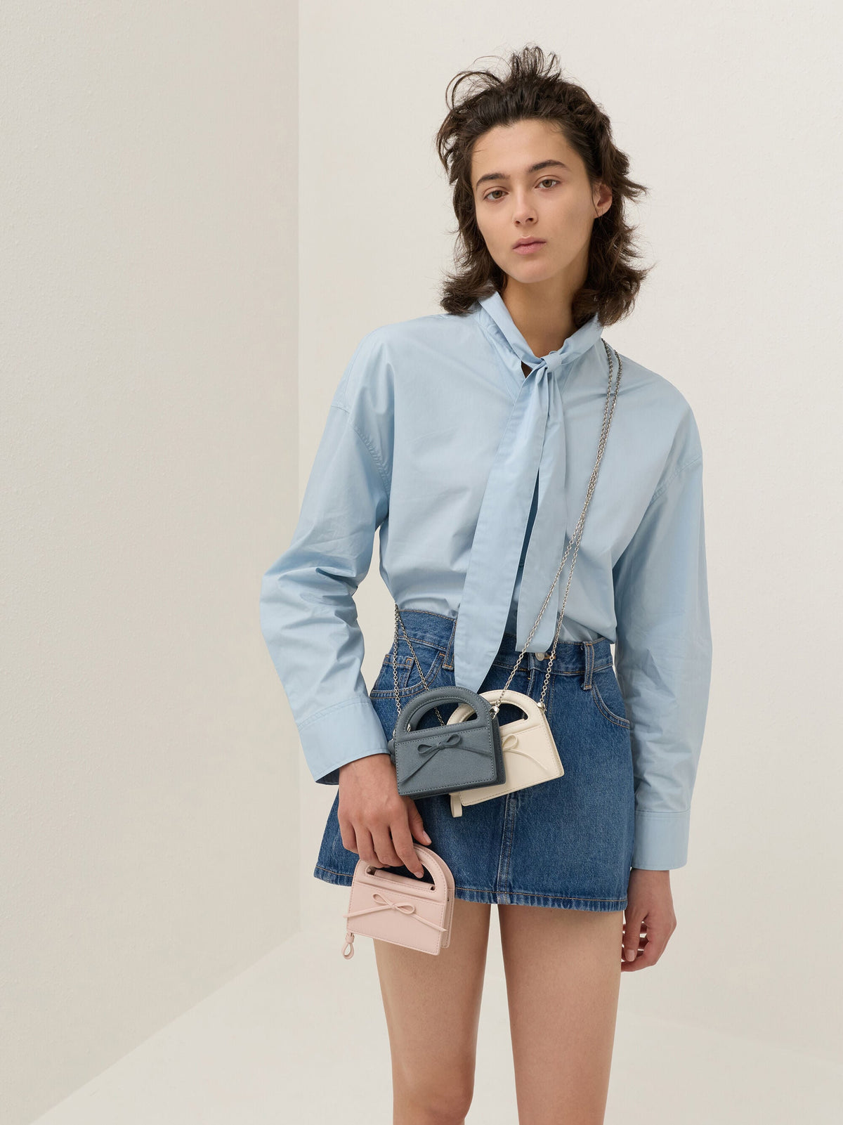 Reese Bow Top Handle Wristlet - Cream | CHARLES & KEITH